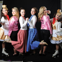 Grease                  Themed on the much loved movie “Grease”, this show is filled with the sights and sounds of the 50’s. Slicked hair, poodle skirts and rock and roll!