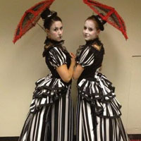 Nights Circus      A cool combination of the past and present. As a performance it is thrilling and unique, as greeters they are outstanding. Original custom costumes are based on period designs with a modern twist.