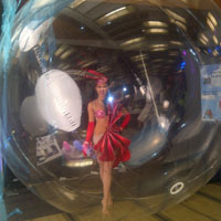 Dancer in a Bubble                  A spectacle! Place one of our dancers or models in this large bubble to create an excellent photo op! Great as a snow globe or for a water themed event!