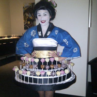 Geisha Lollipop      Our lollipop dress can be themed for a variety of events. Around the World theme, or a black tie affair, this dress is a great addition to any event!